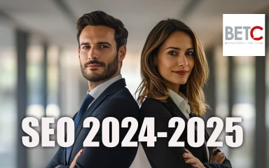 Deux professionnels souriants en costume, symbolisant les tendances SEO 2024-2025, avec le logo de BETC communication en arrière-plan
