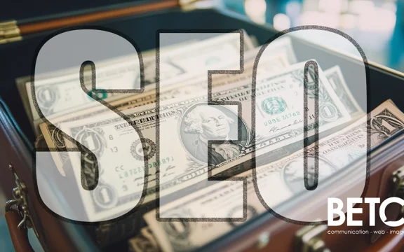Valise remplie de billets avec le mot 