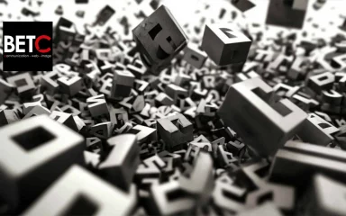 Image artistique représentant des blocs de lettres en 3D, symbolisant la recherche de mots-clés et les stratégies SEO personnalisées de BETC Communication.