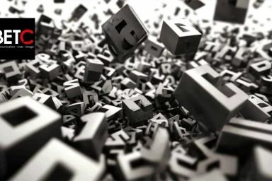 Image artistique représentant des blocs de lettres en 3D, symbolisant la recherche de mots-clés et les stratégies SEO personnalisées de BETC Communication.